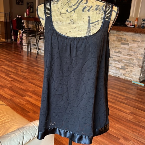 Tops - Size XL black blouse with a swirl design and ladder like straps